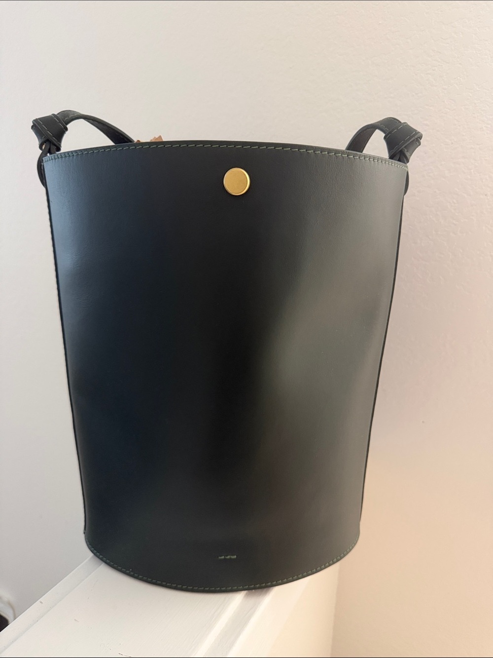 Minimalist Black Bucket Shoulder Bag with Gold Stud
